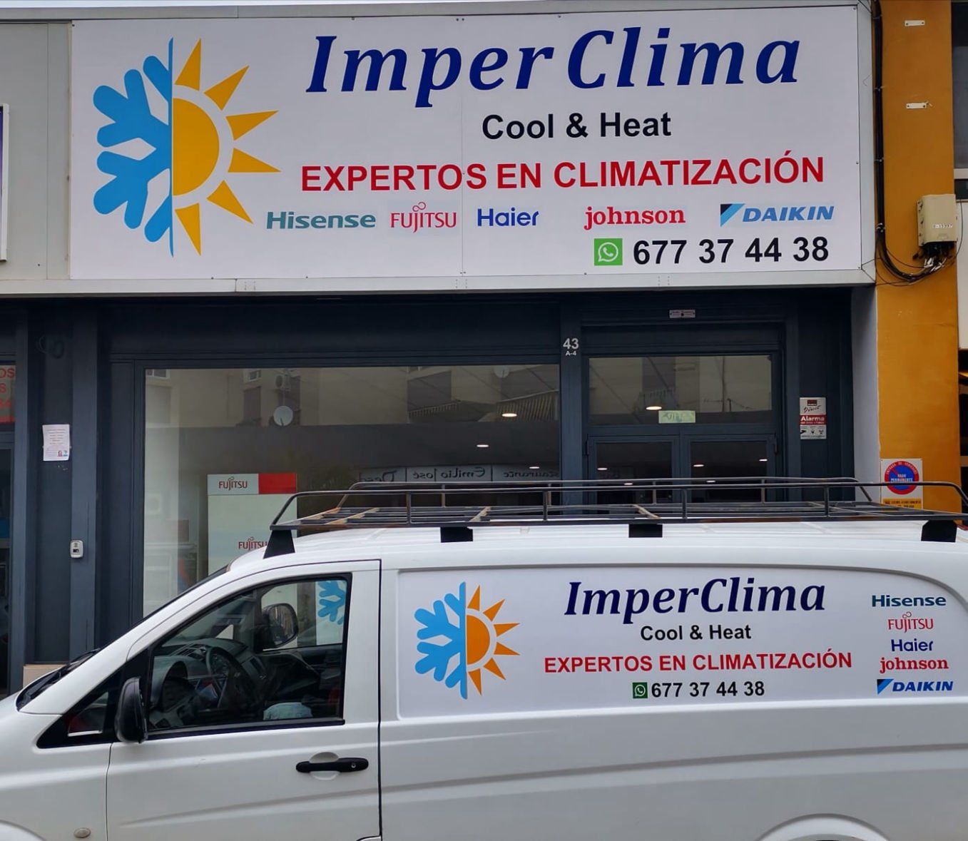Local de ImperClima con el rótulo de la empresa y una de sus furgonetas aparcada delante